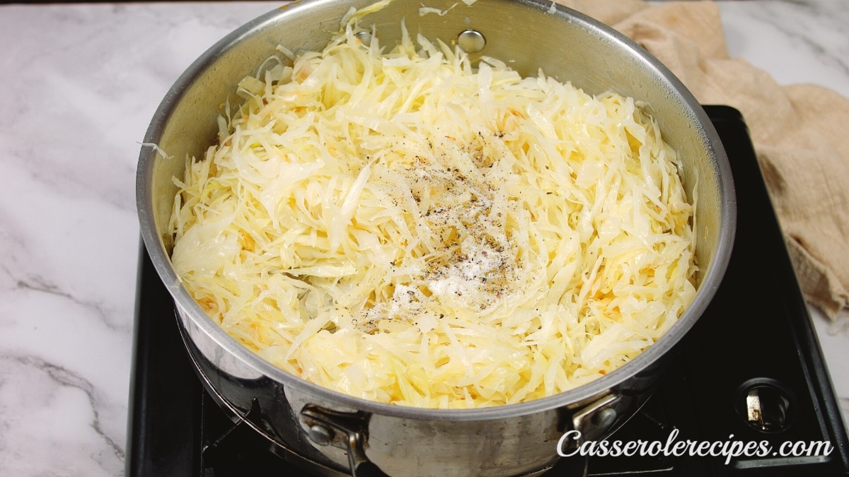 cabbage mixture wilted in a pan on the stovetop