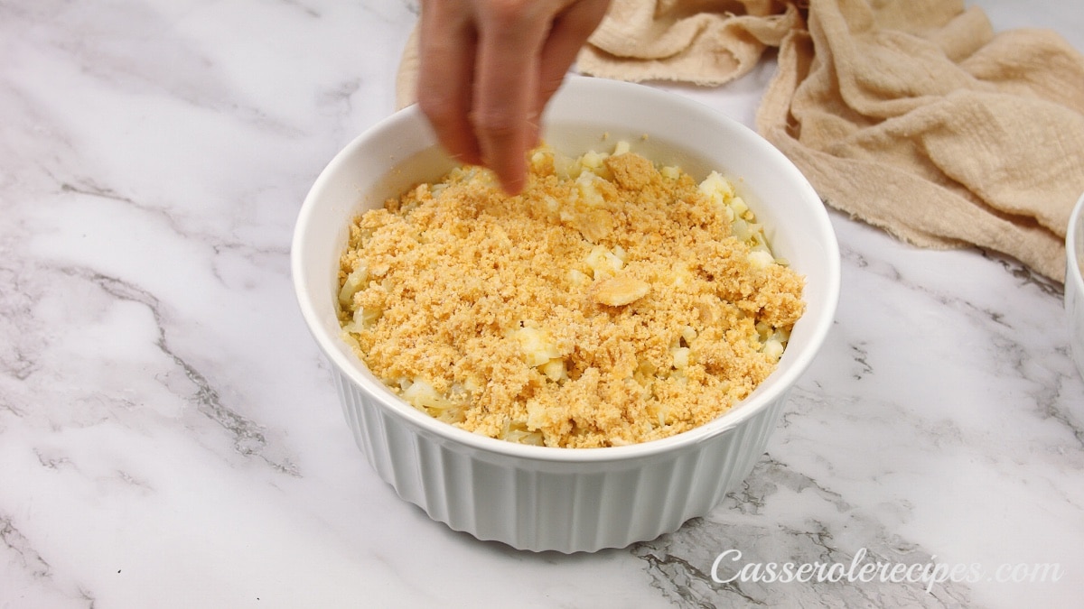 unbaked casserole topped with breadcrumbs