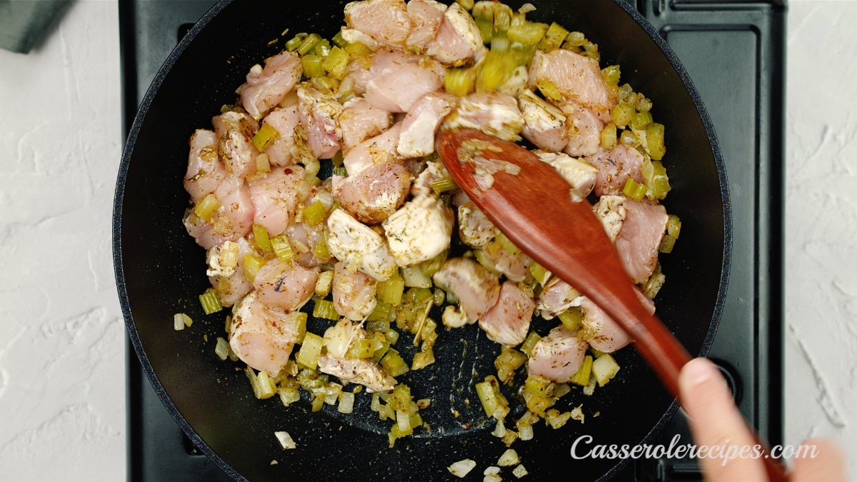 raw chicken chunks added to the onion mixture