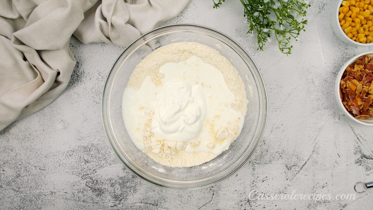 flour mixture topped with sour cream before mixing