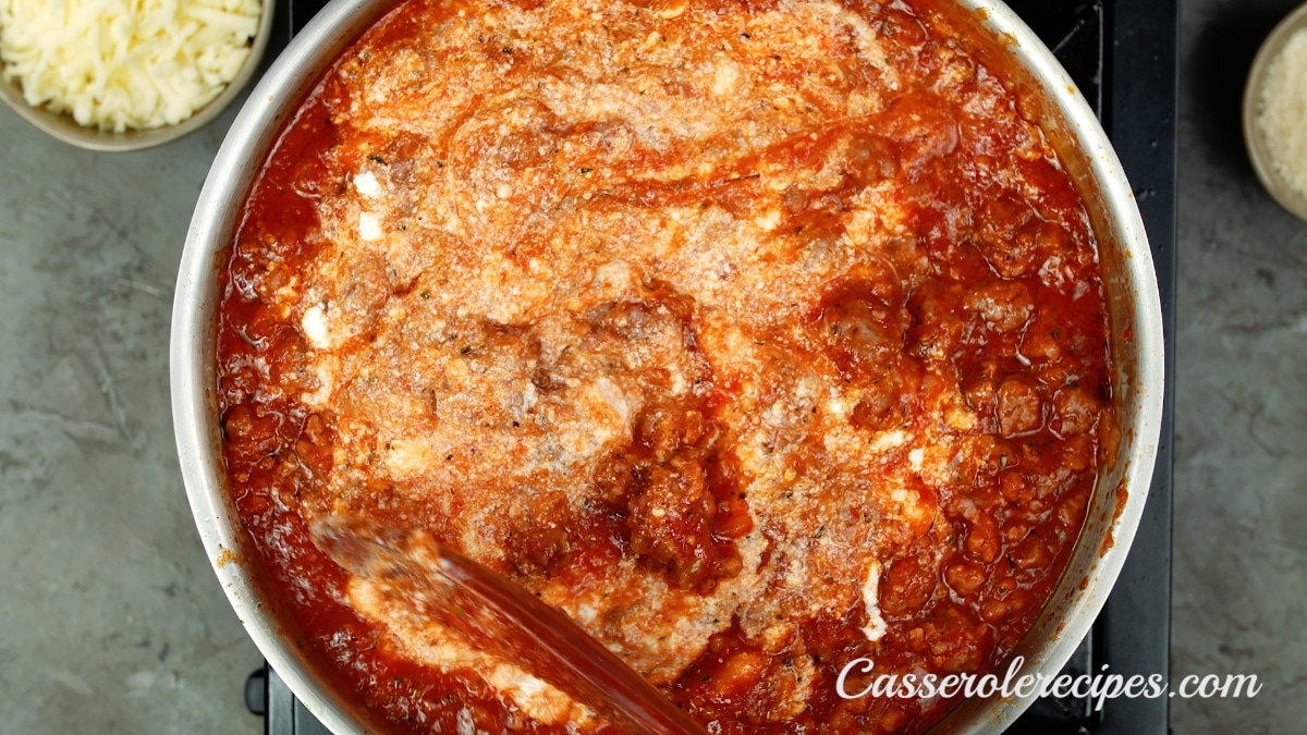 ricotta, chicken stock, and cream stirred into tomato sauce