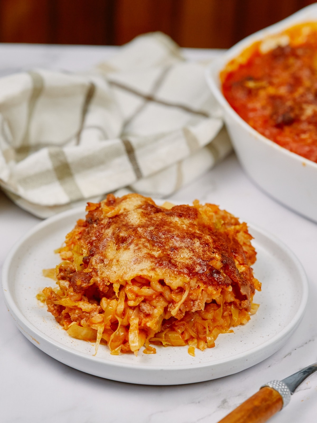 a serving of cabbage roll casserole on a white plate