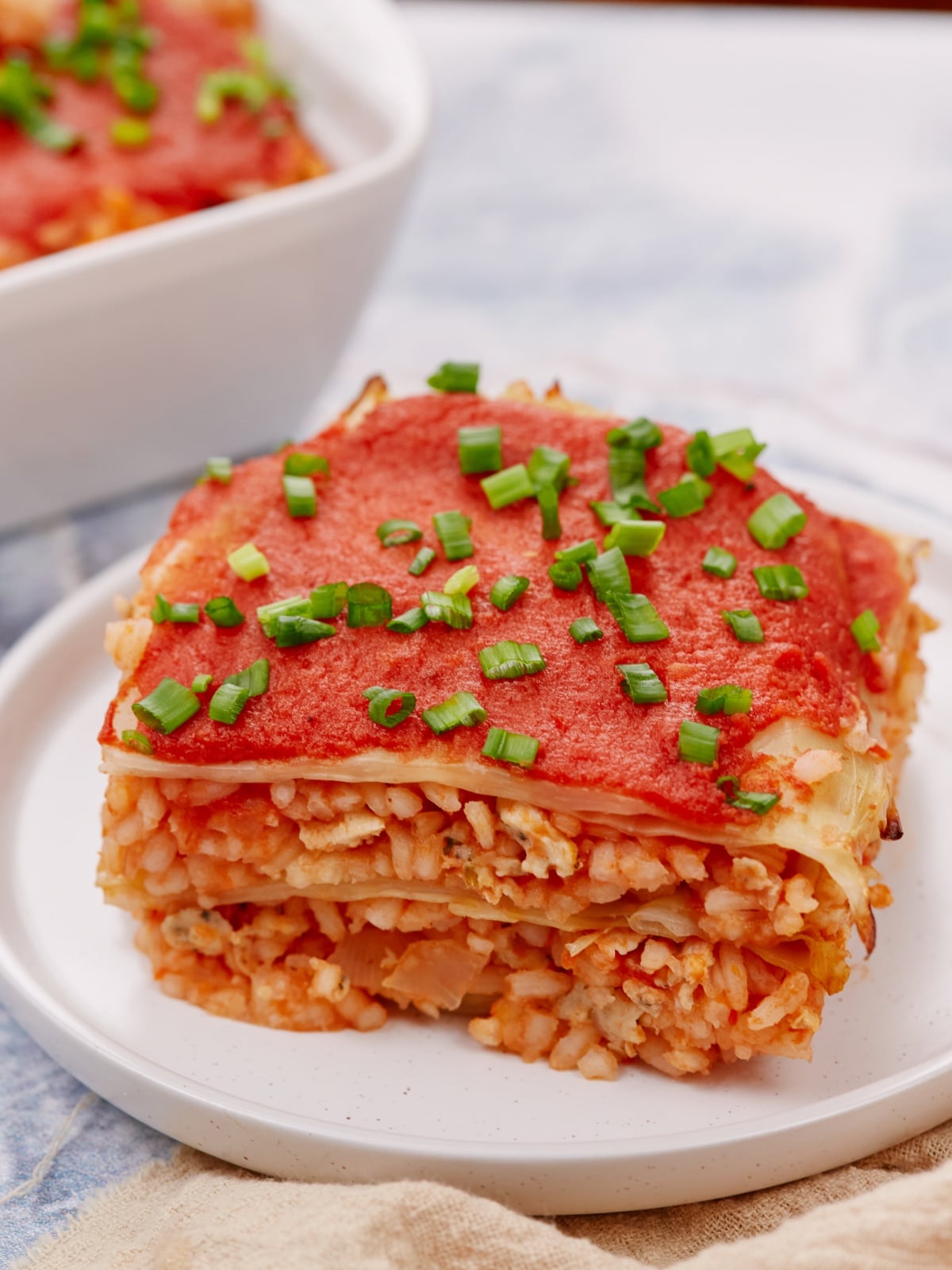 a serving of cabbage rolls casserole on a white plate