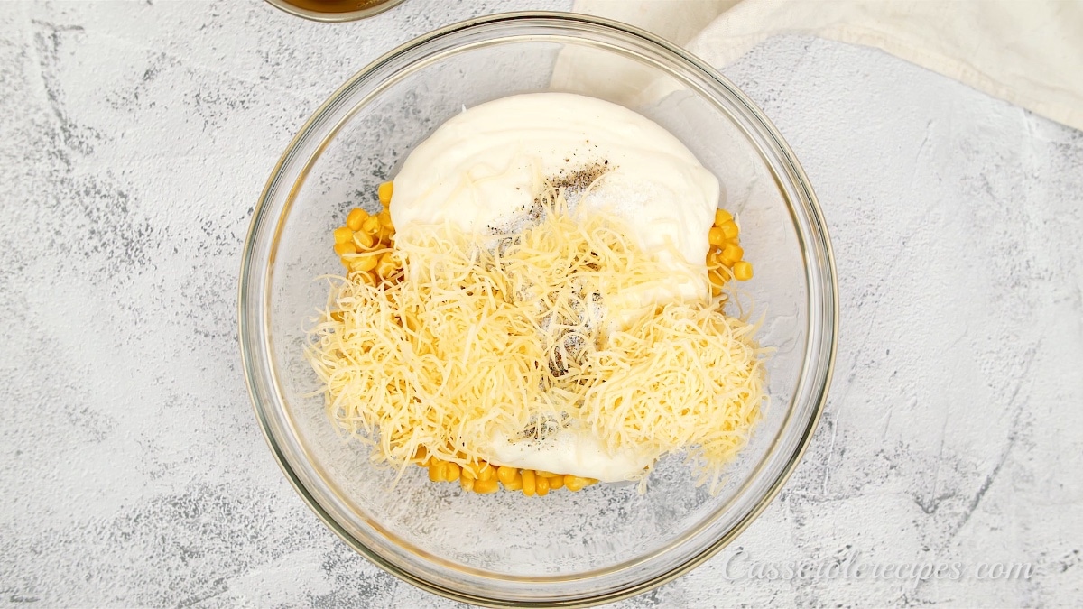 cheese added to seasonings and corn