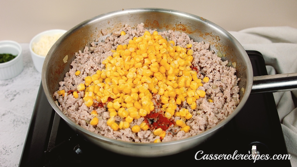 corn added to browned turkey