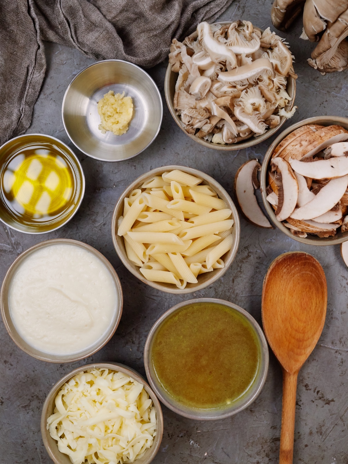 ingredients for creamy mushroom casserole in small bowls