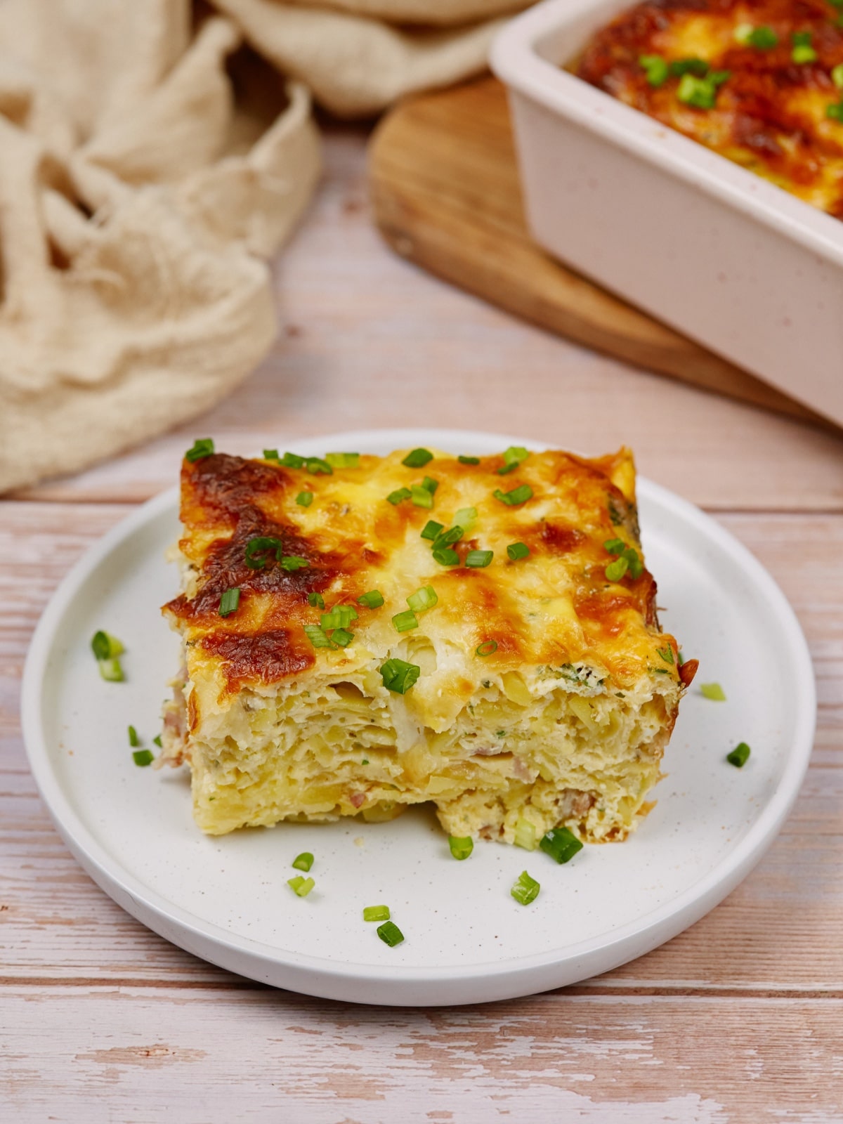 a serving of egg and hashbrown casserole on a plate