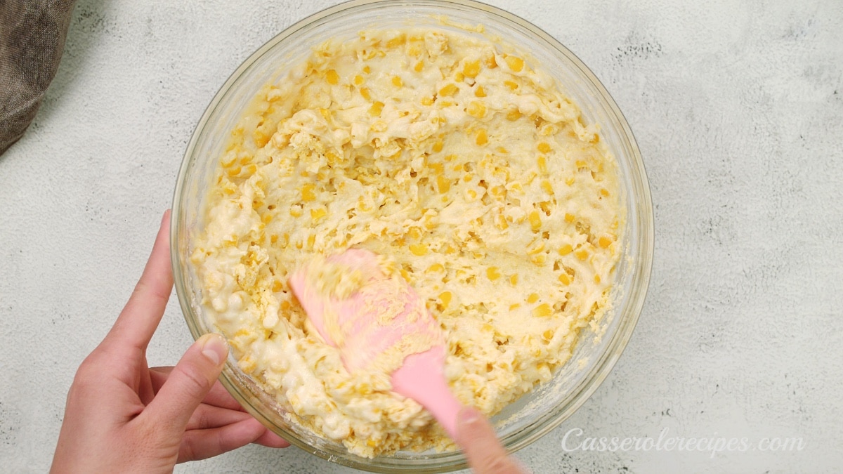 mixing corn and flour mixture together