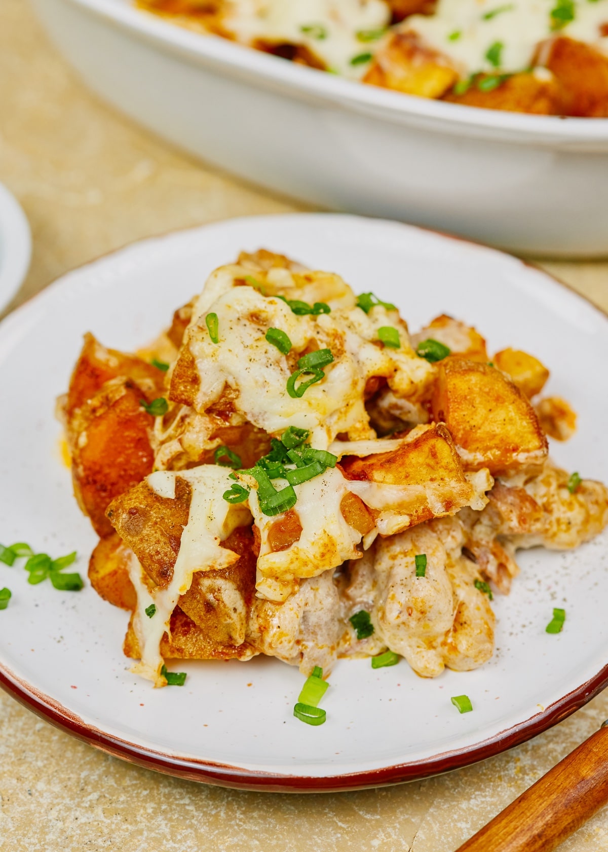 a plate of potato and chicken casserole