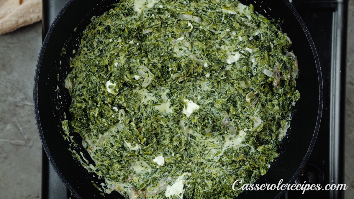 spinach mixture stirred together in skillet