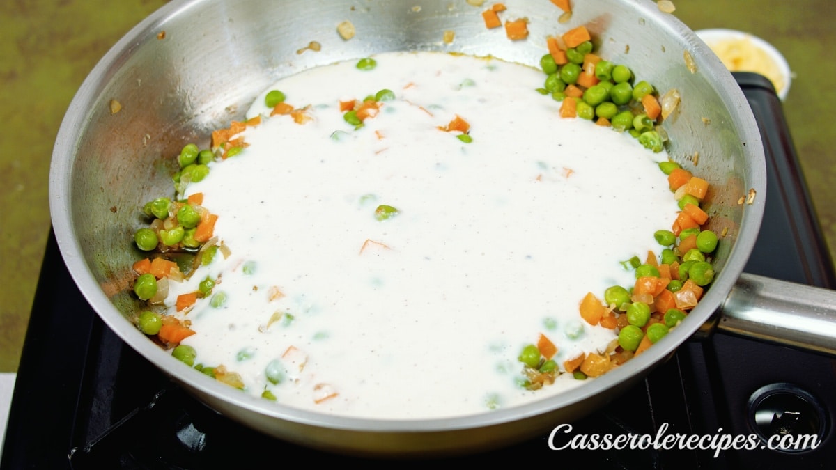 cream added to the pan with vegetables