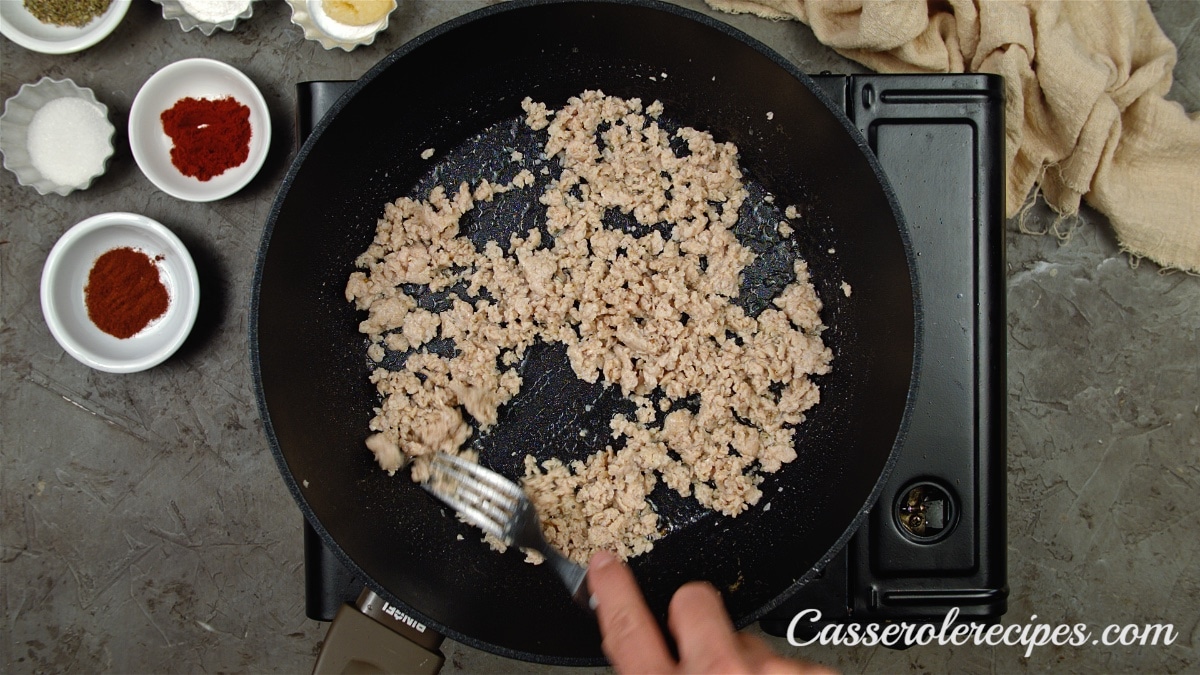 meat browning in cast iron skillet