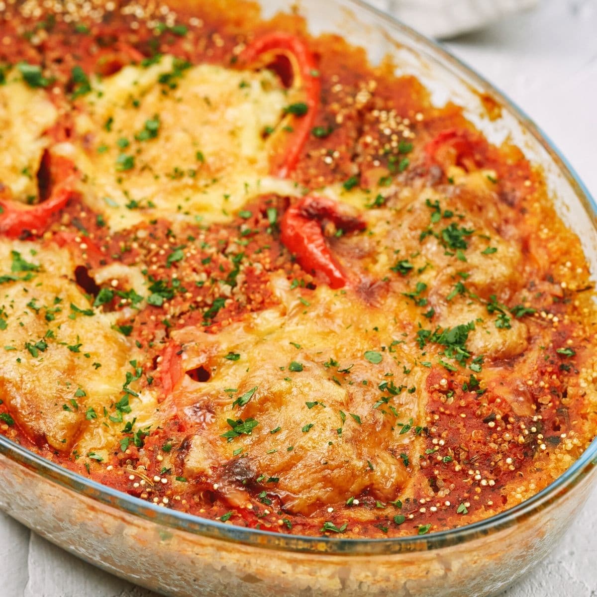 Stuffed pepper casserole freshly baked in a transparent dish.