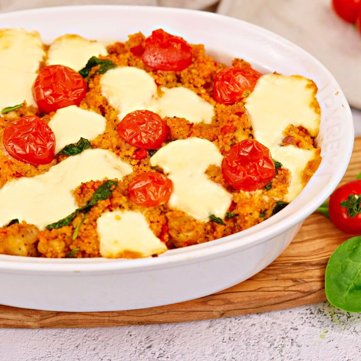 Italian chicken caprese casserole in a white plate.