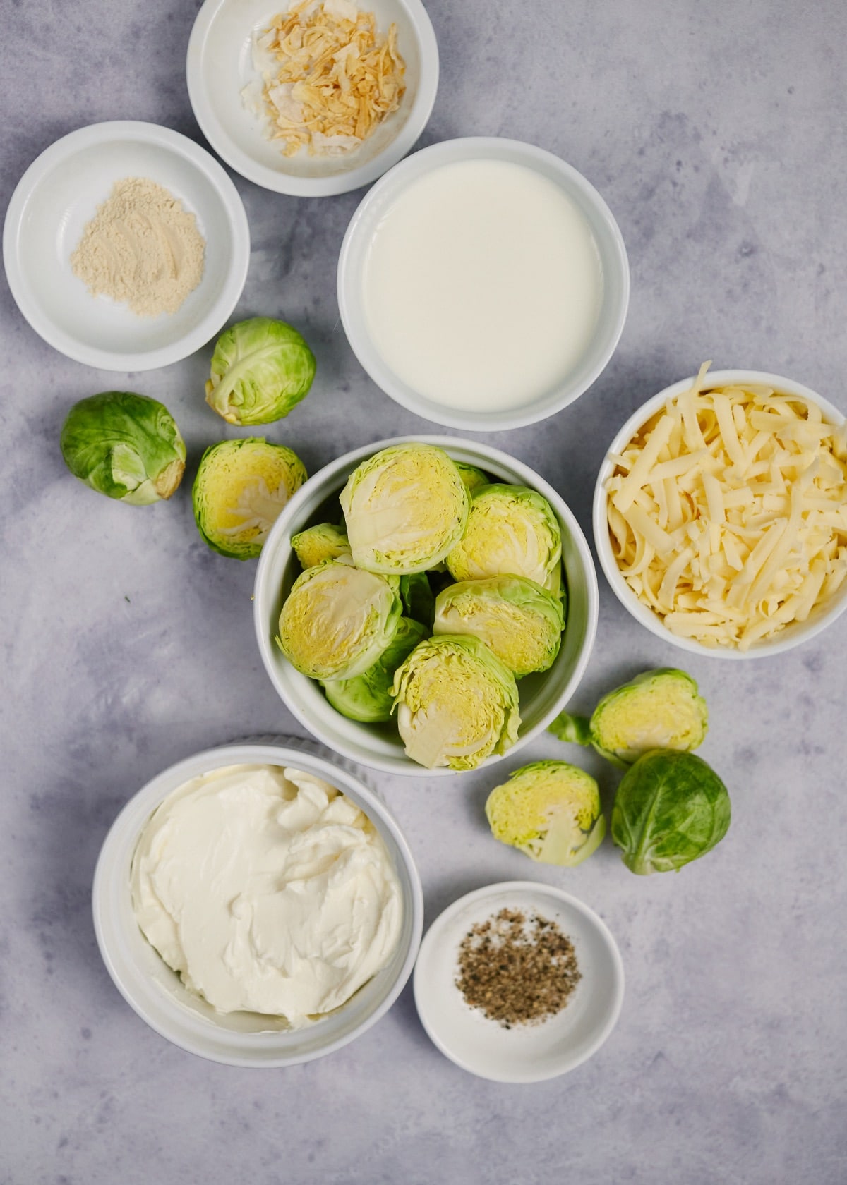 ingredients for brussel sprout casserole in small bowls