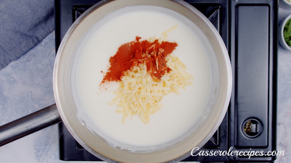 mozzarella, feta, and paprika on top of cream mixture