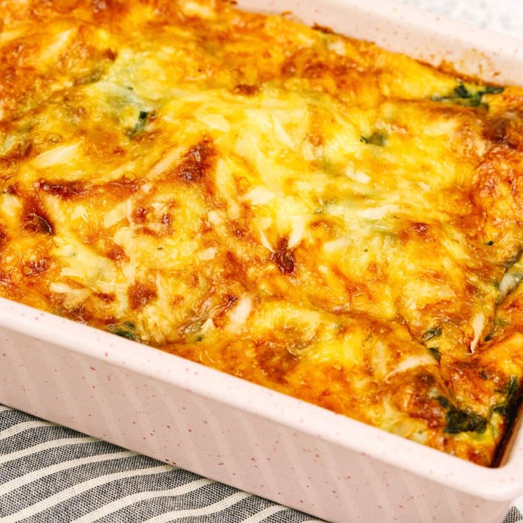 baking dish of hashbrown and spinach breakfast casserole