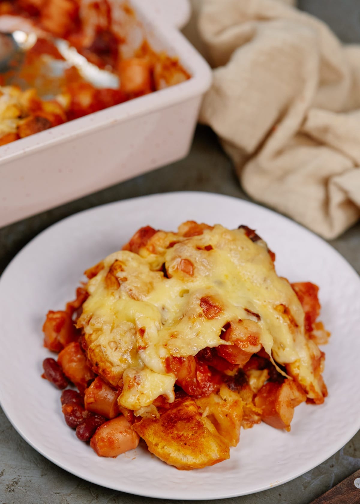 baked Mexican biscuit casserole on a white plate