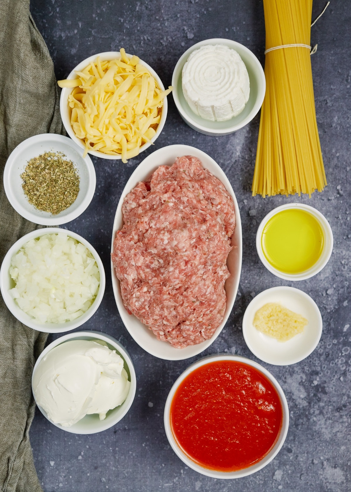 ingredients for spaghetti lasagna in small bowlss