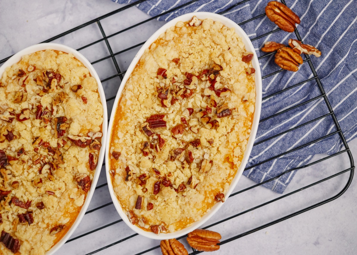sweet potato casserole in two baking dishes on a cooling rack