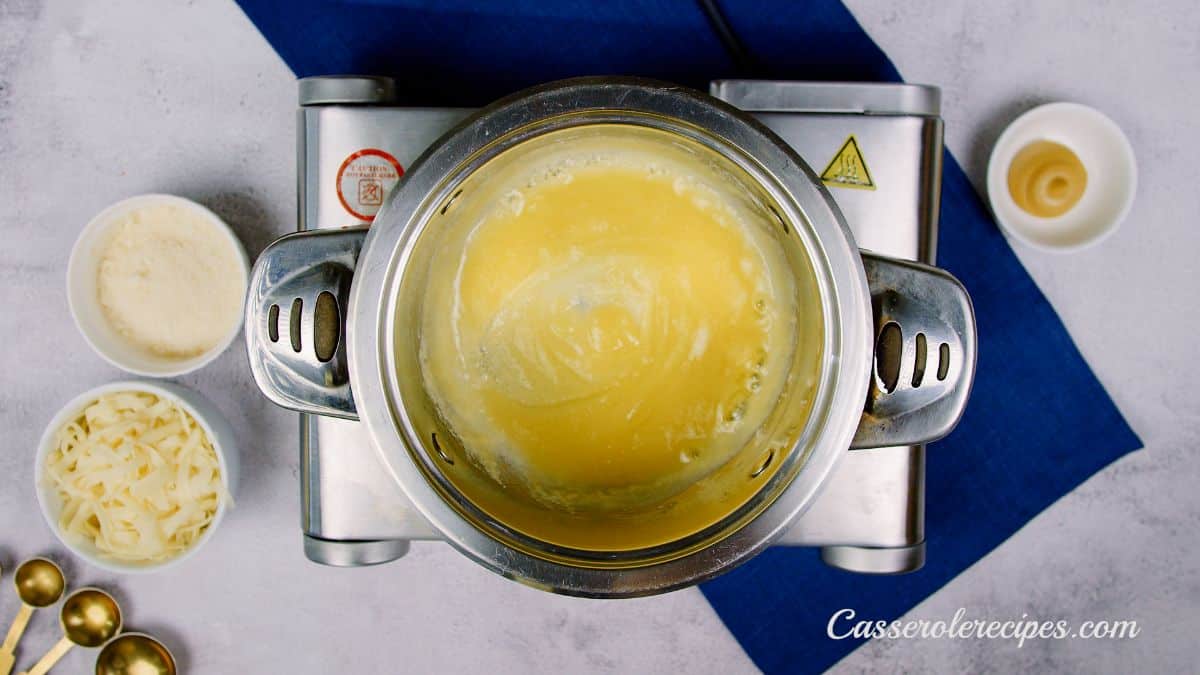 melted butter in saucepan on hot plate