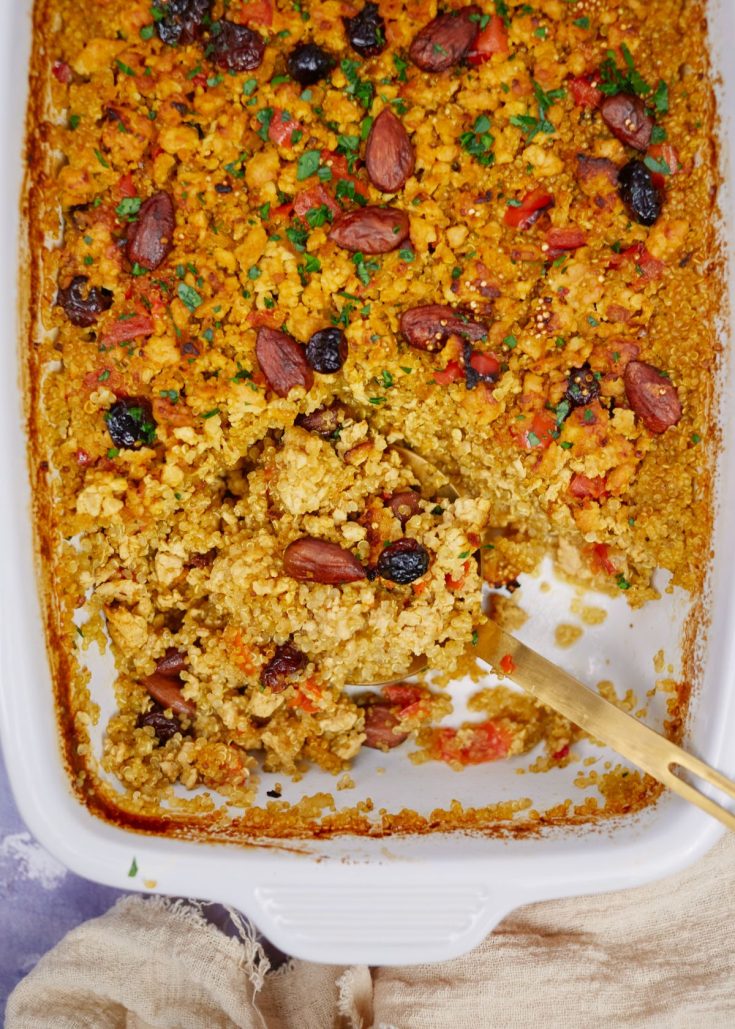 silver spoon in casserole dish of quinoa and ground turkey