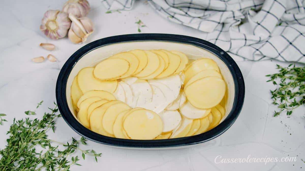 layers of potatoes in baking dish