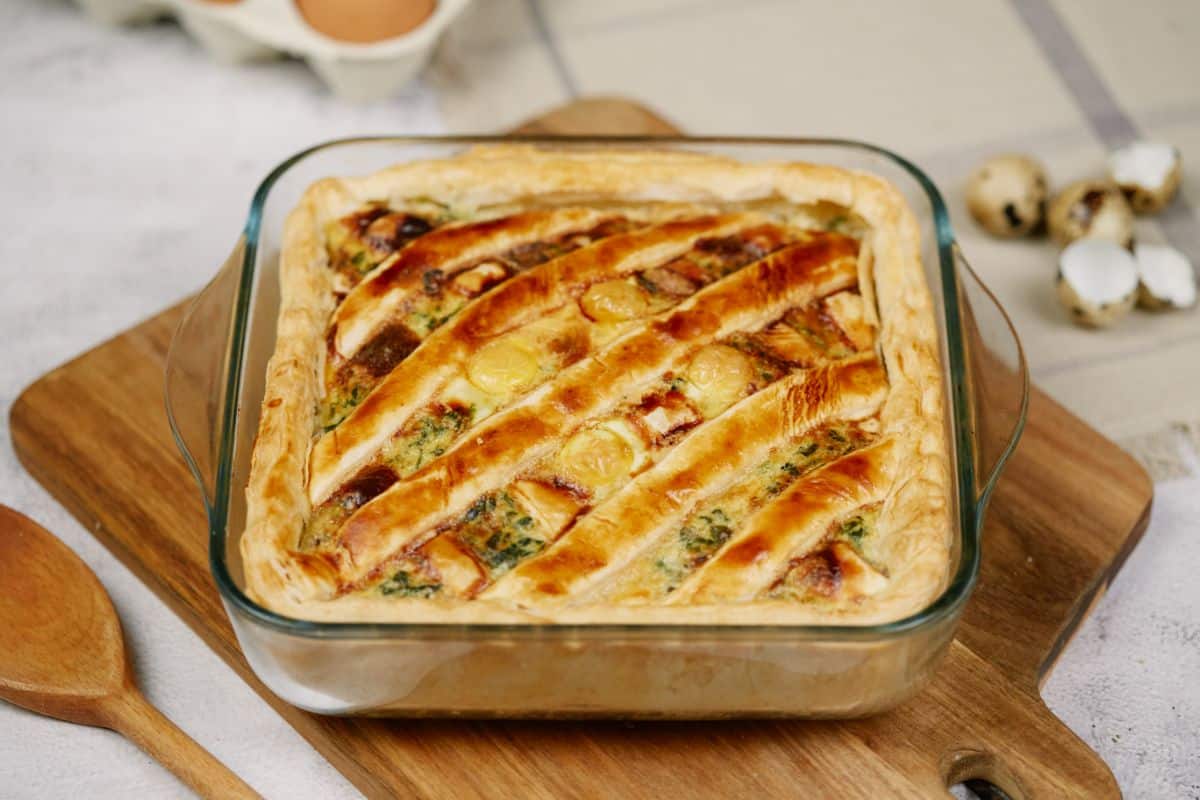 puff pastry egg casserole in square glass baking dish