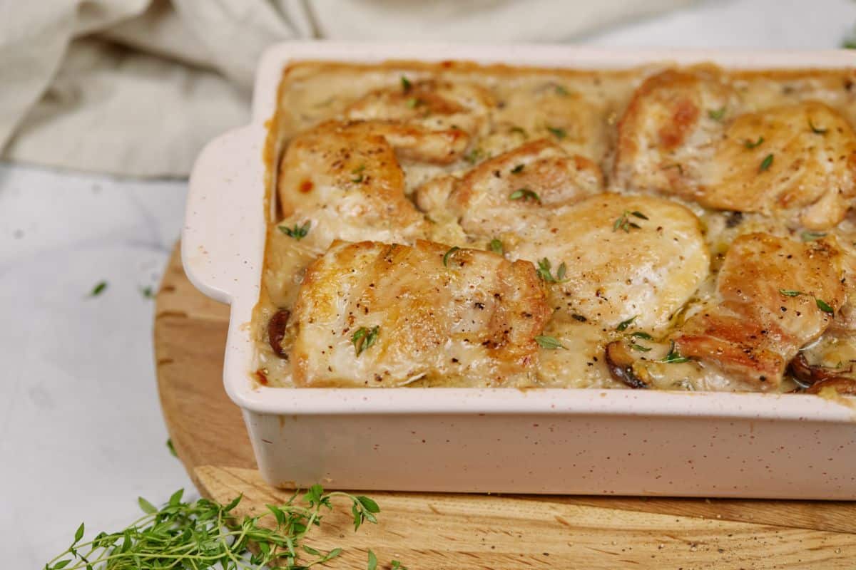 baked chicken fricassee with chicken thighs on top of casserole