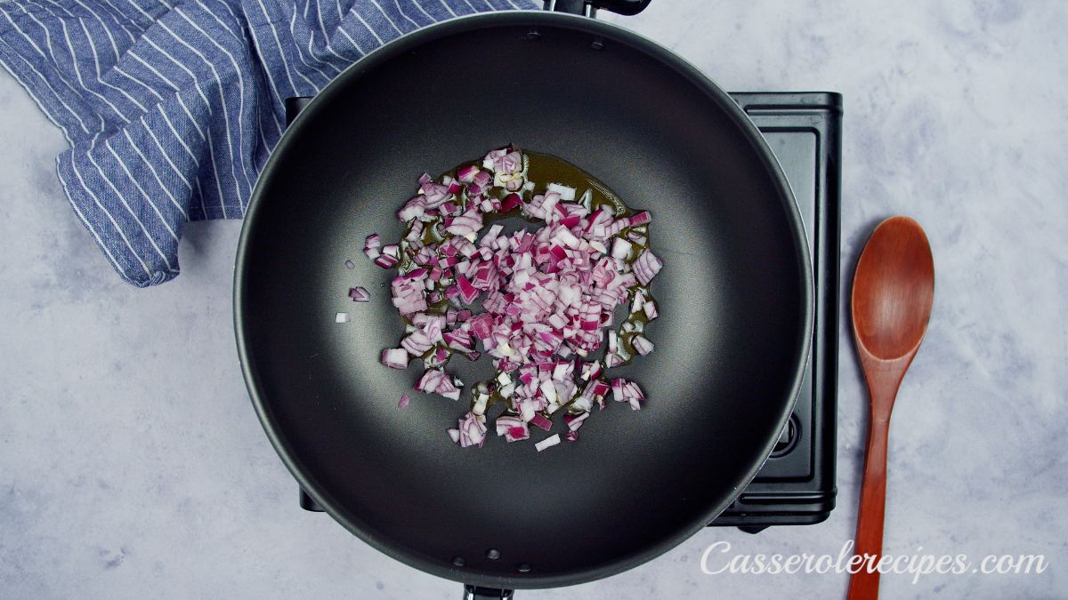 red onions in black skillet