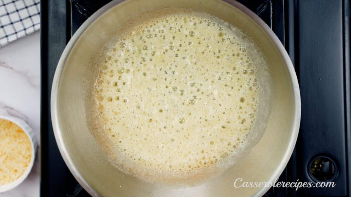 bubbling flour and butter in skillet on hot plate
