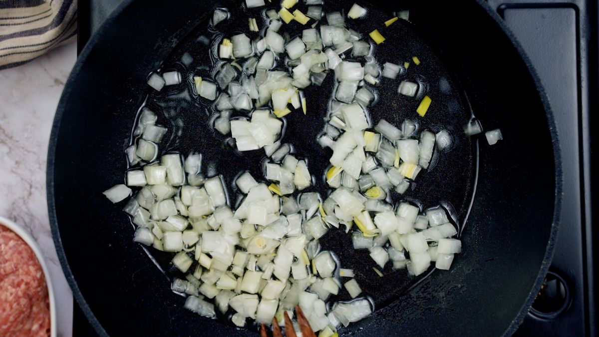 onions in skillet on hot plate