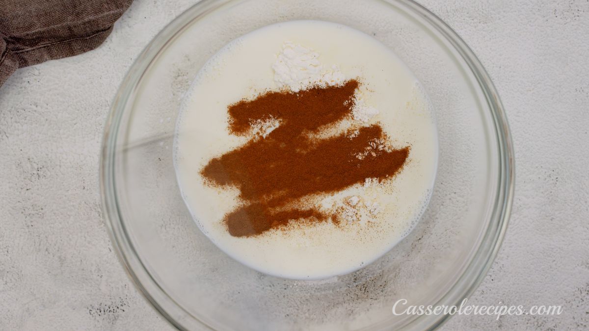 cinnamon and milk in large glass bowl