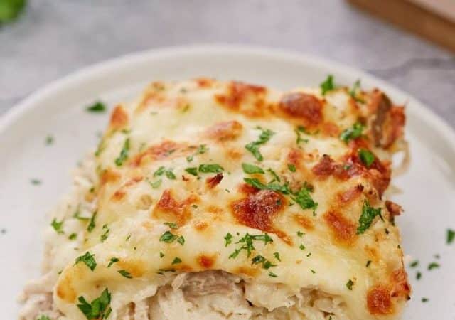 serving of chicken thighs casserole on white plate