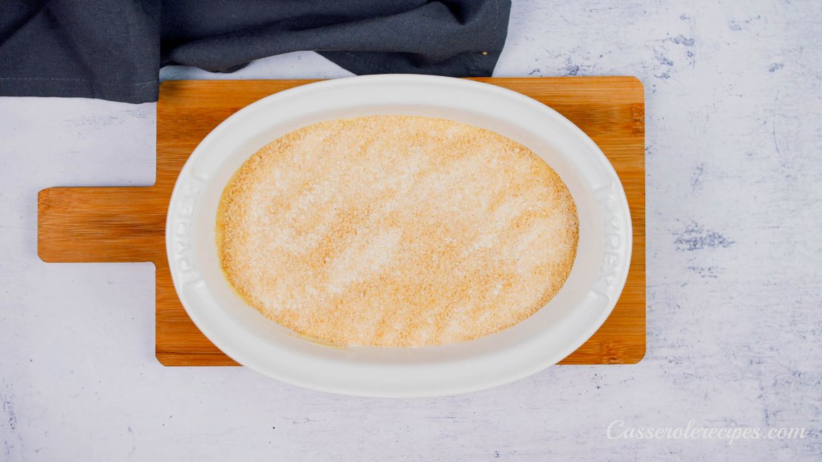 batter for butterscotch pudding casserole unbaked in white oval baking dish