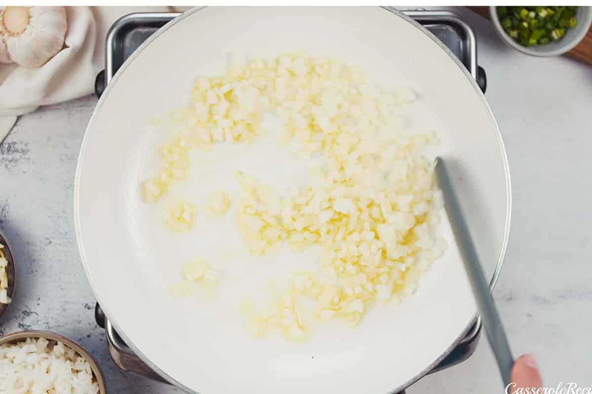 sauteeing onions to make Japanese Rice Gratin