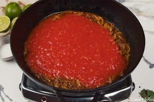 ingredients being combined to make North Indian Baked Eggs