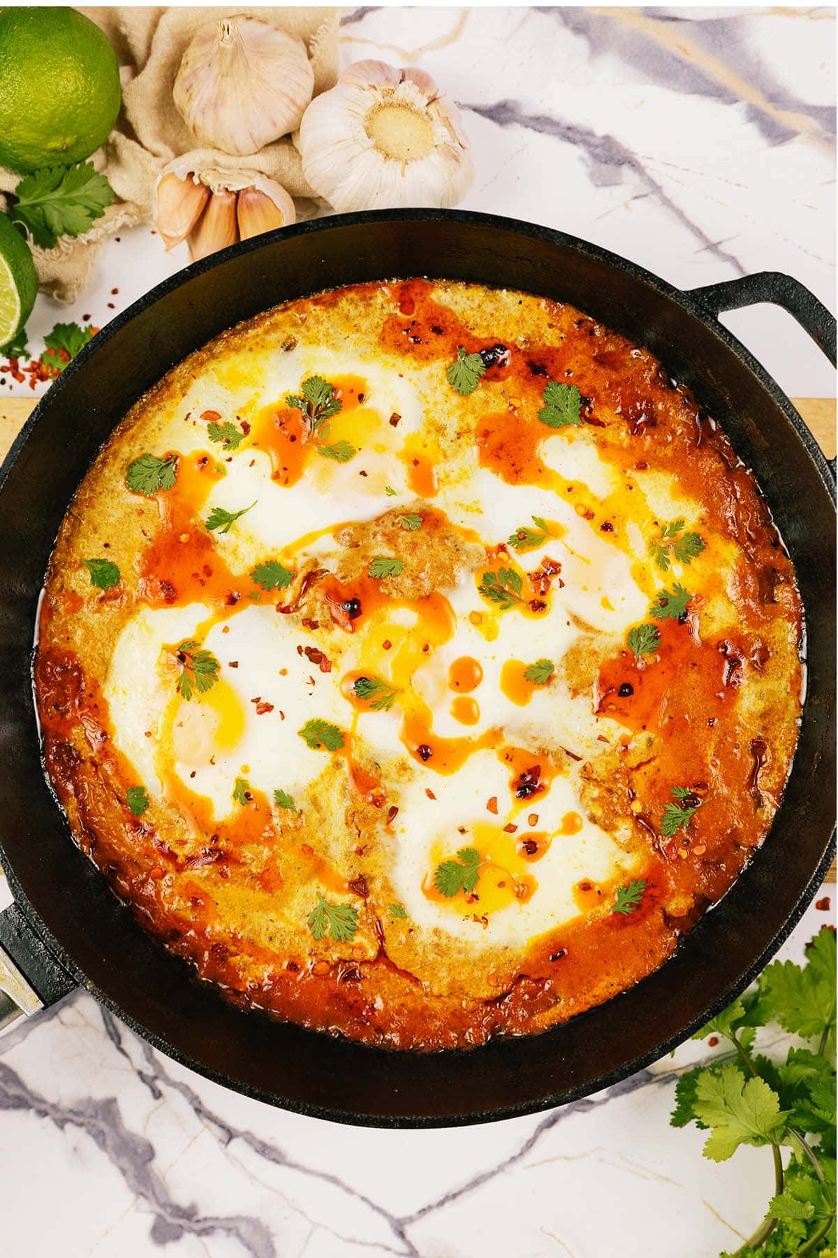 overhead view of North Indian Baked Eggs in a casserole dish