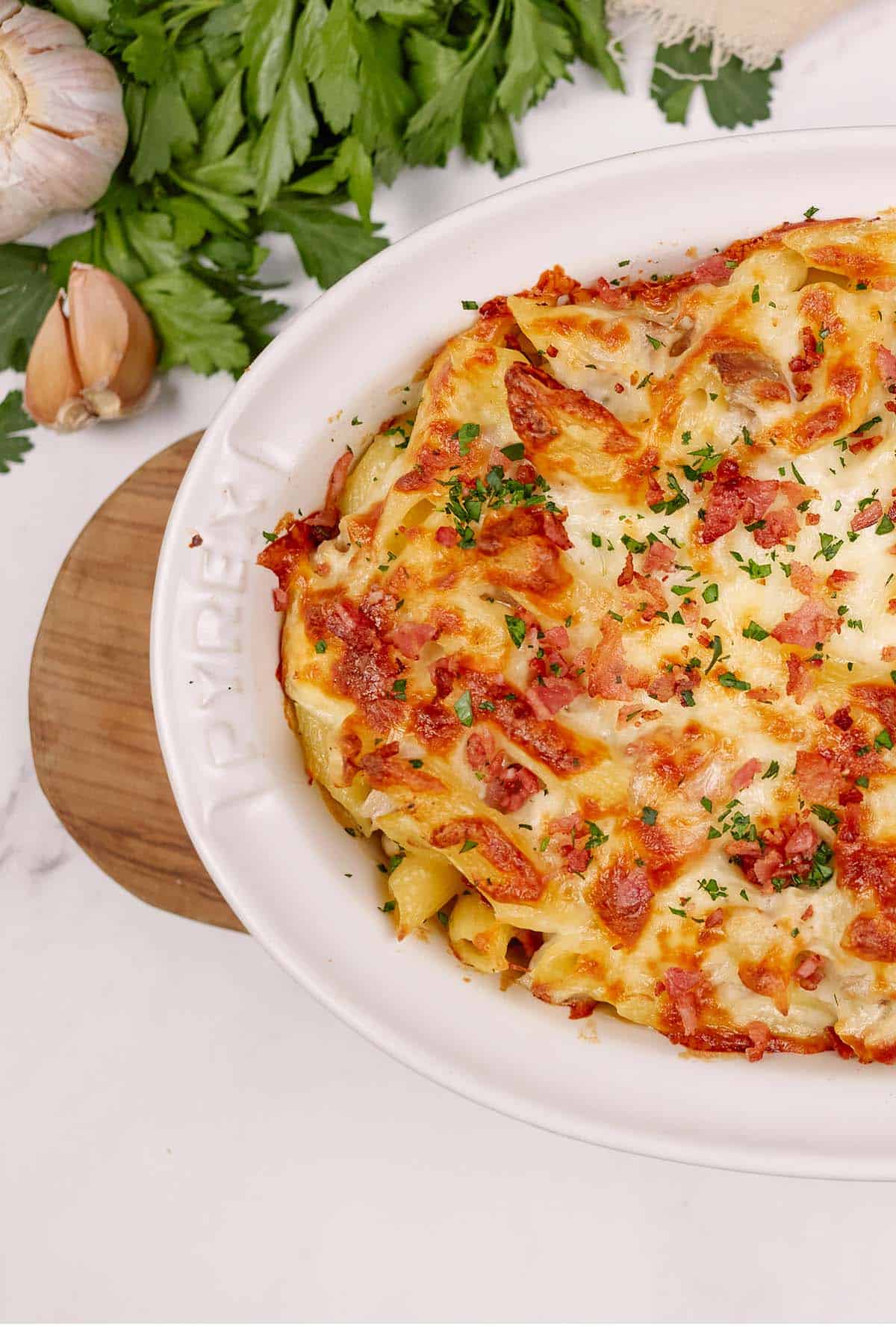 baking dish of chicken and bacon casserole on a table