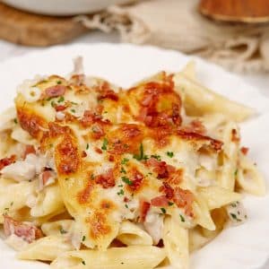 closeup of a serving of chicken and bacon casserole on a plate