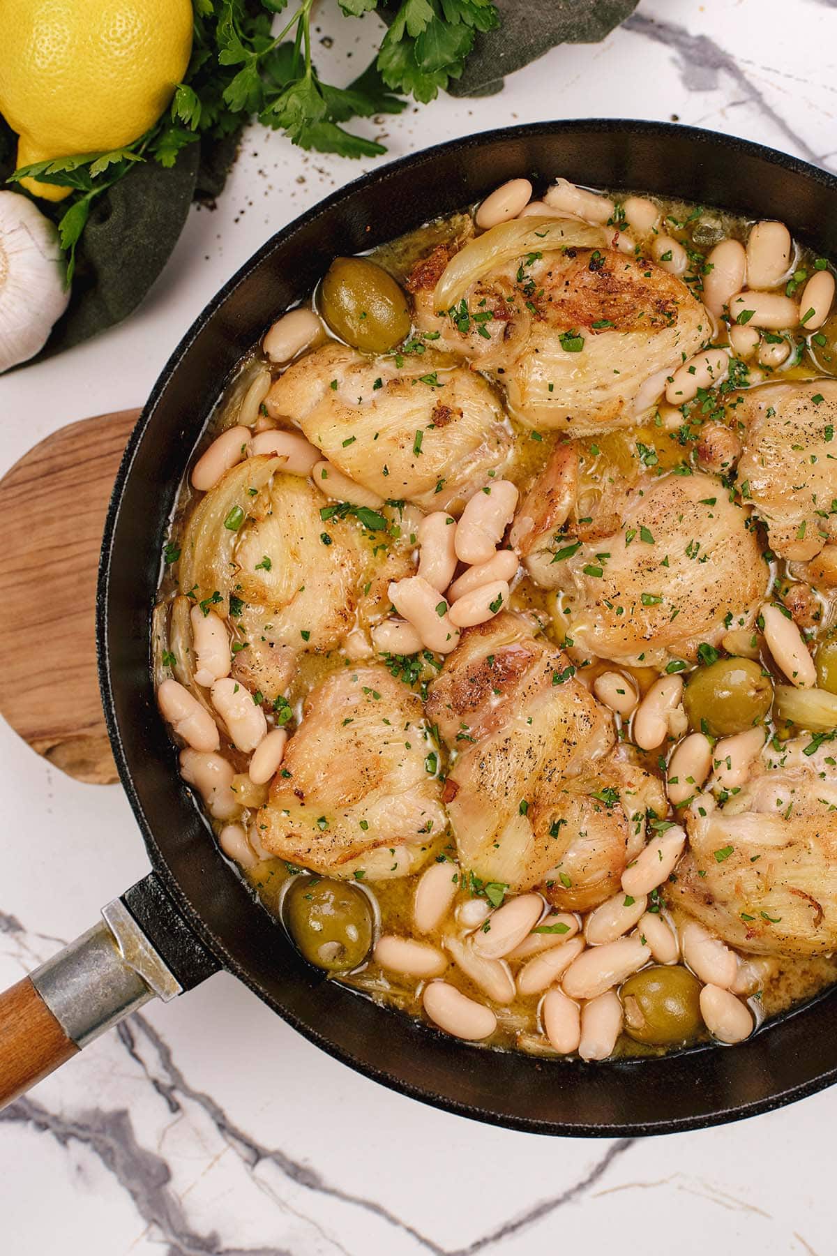 closeup of a pan of chicken thigh and fennel casserole