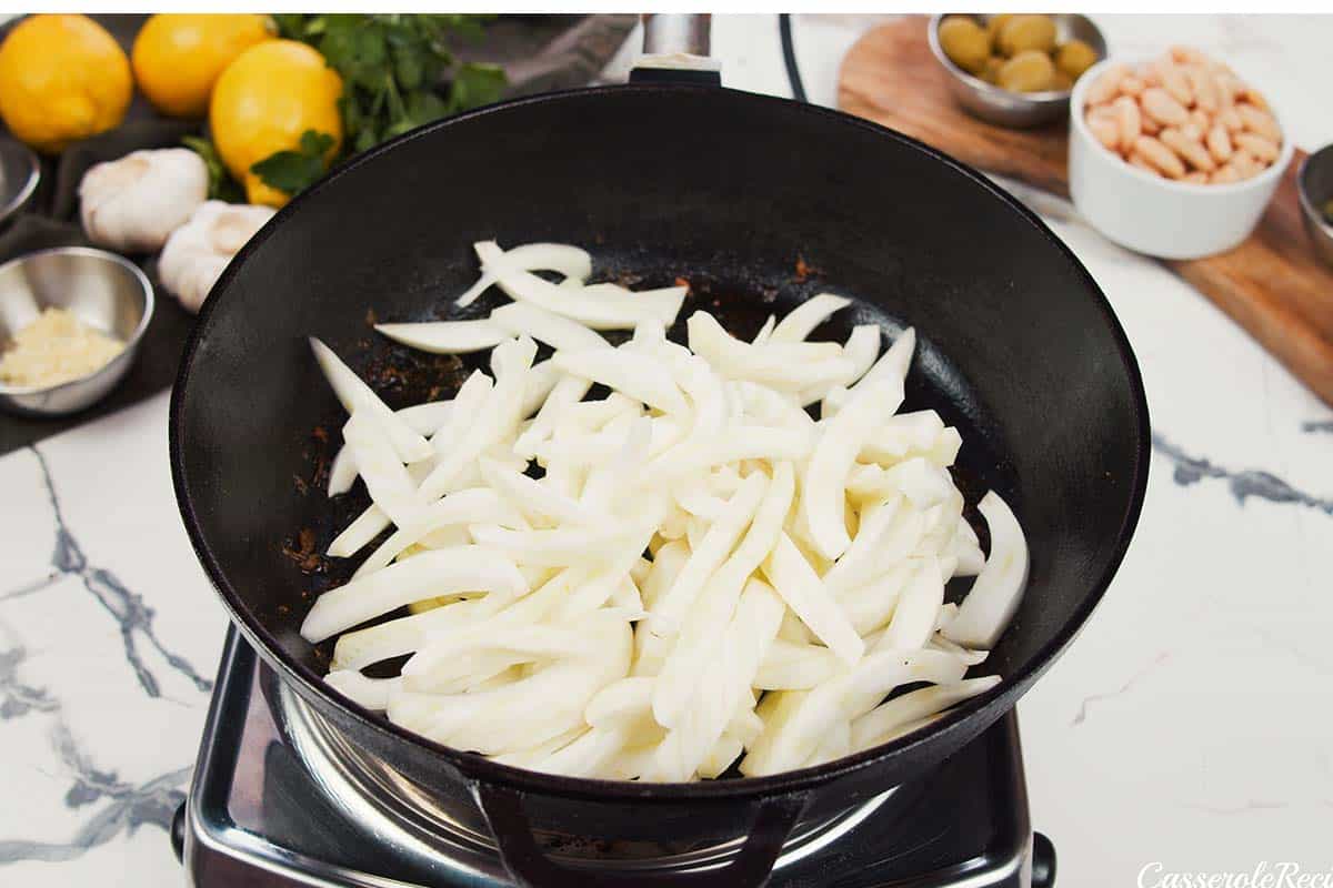 sauteeing fennel to make Chicken and Bean Summer Casserole