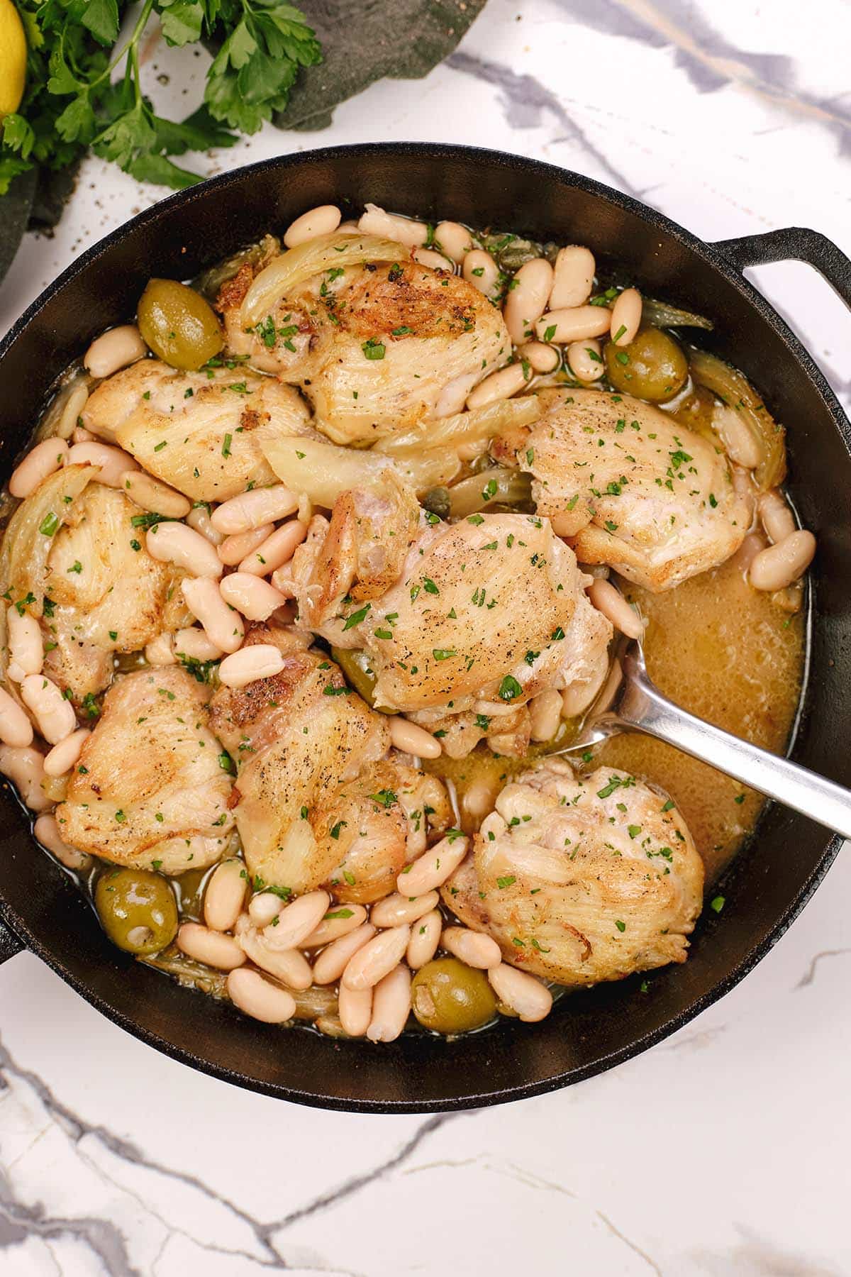 fennel and chicken casserole being served from a pan