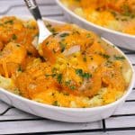 fork lifting a bite of copycat kfc famous bowl casserole from a bowl