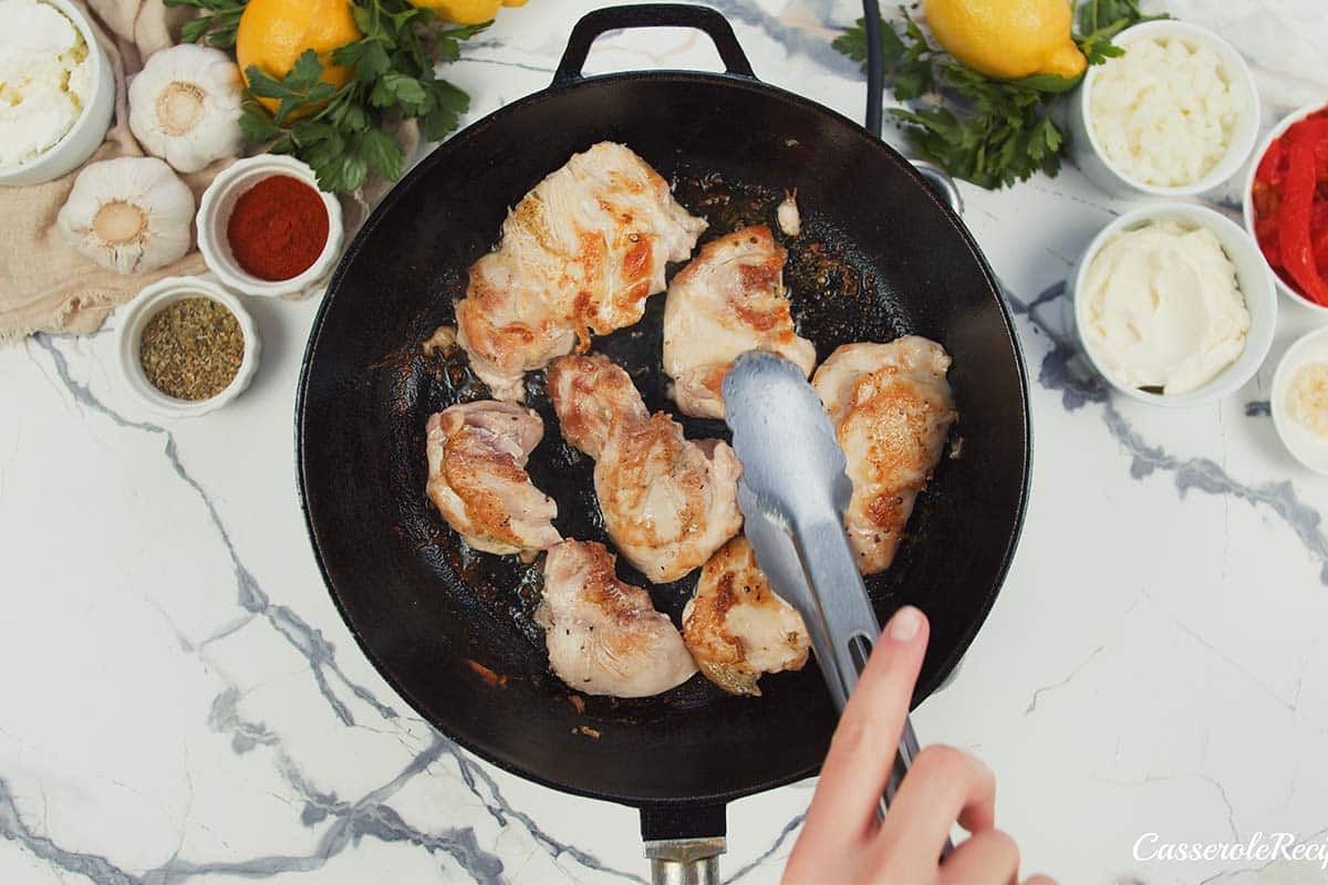 chicken being cooked ot make creamy chicken casserole