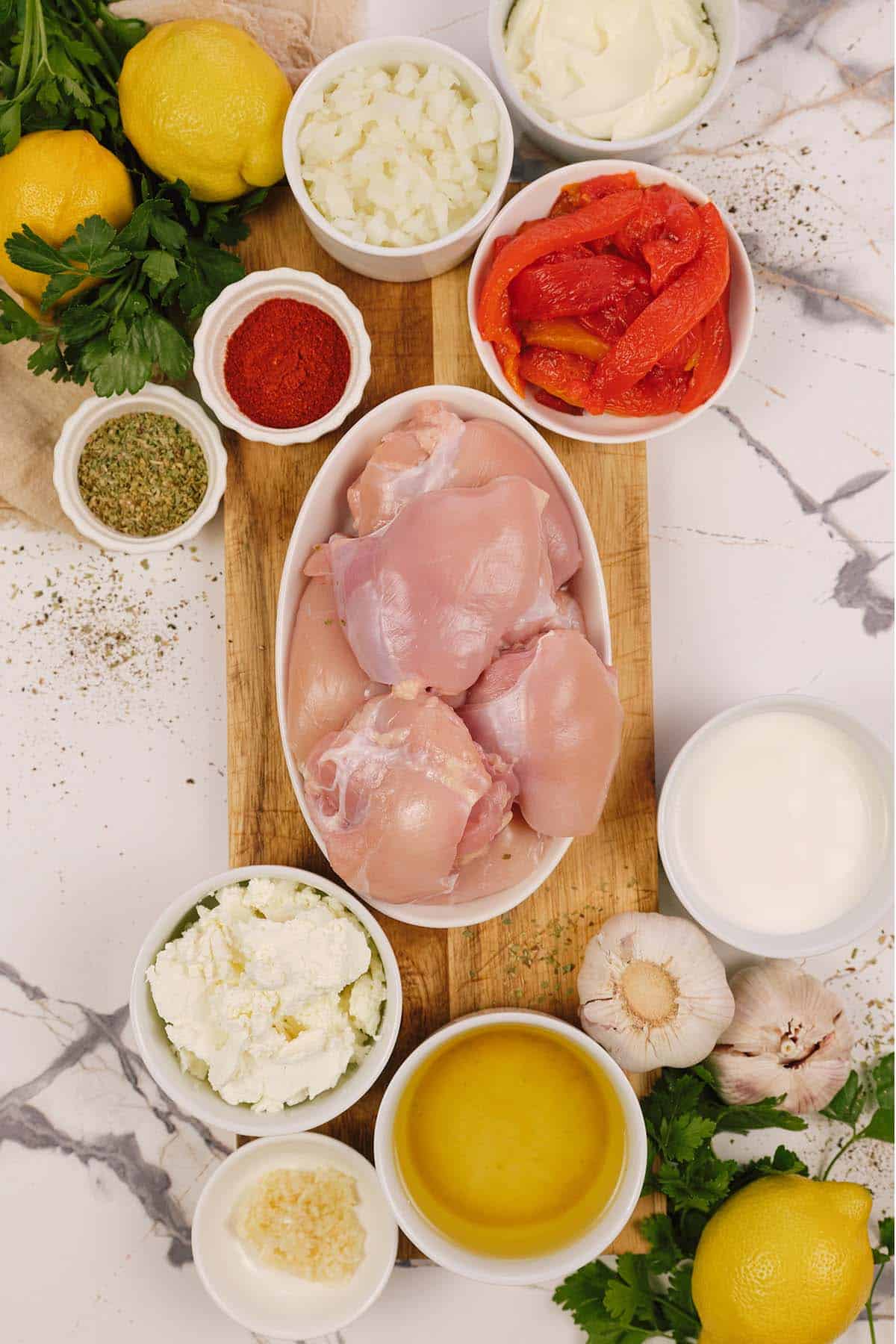 overhead view of ingredients to make creamy chicken casserole laid out on a table