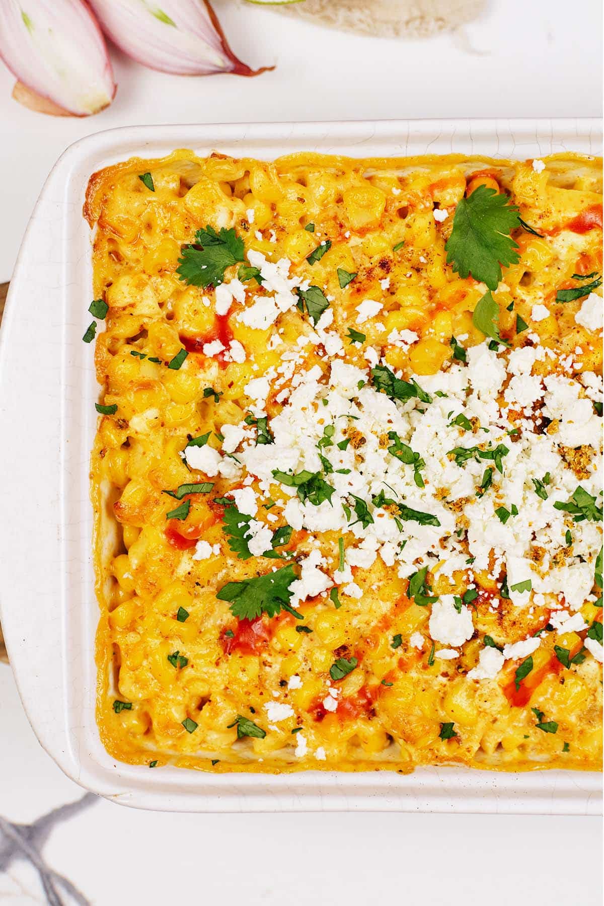 closeup of a casserole dish filled with mexican street corn casserole