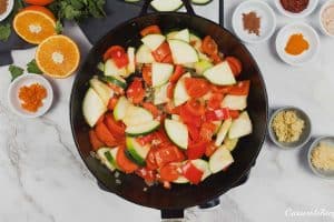 vegetables being sautéed to make moroccan chicken casserole