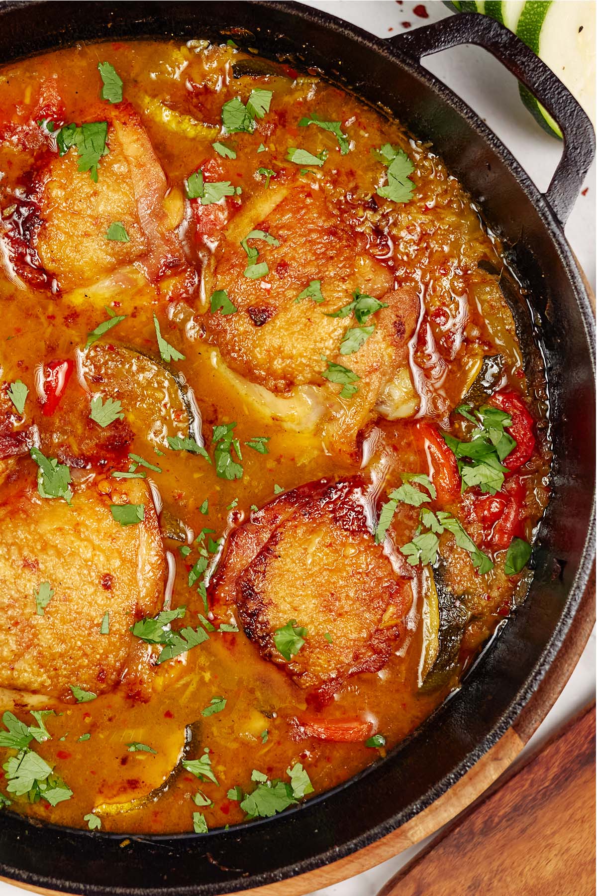 moroccan chicken casserole in a cast iron skillet