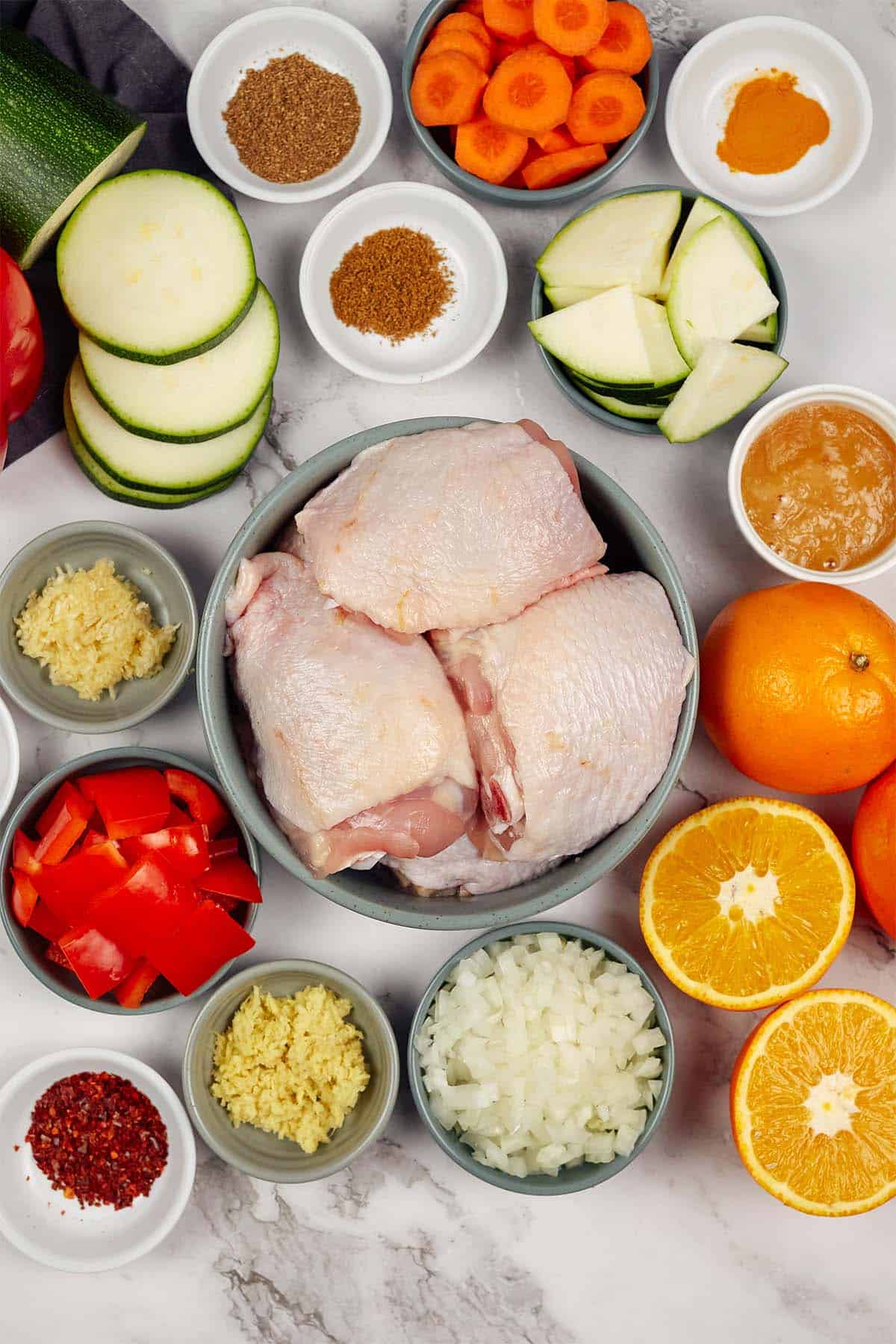 ingredients laid out on a table to make moroccan chicken casserole